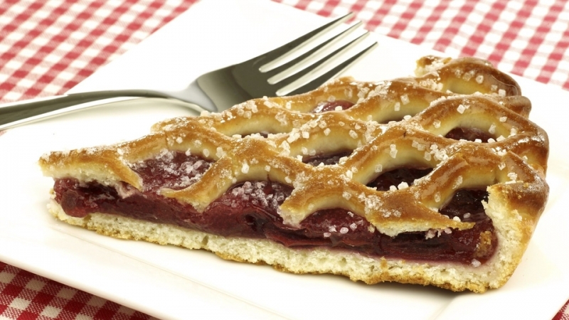 slice of decorated cherry pie called “vlaai” in Holland